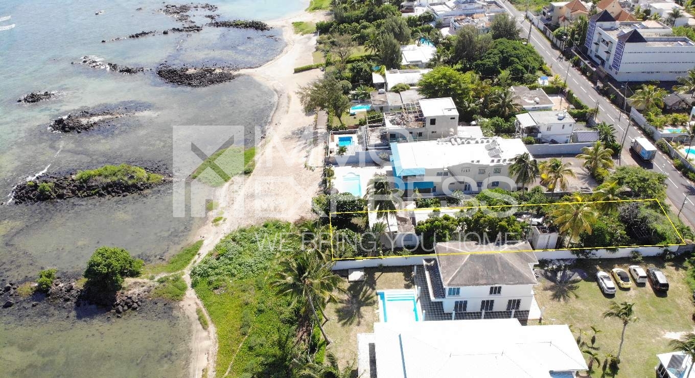 Beachfront plot amidst a flourishing neighbourhood
